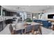 Kitchen with dark cabinets, white quartz countertops, and stainless steel appliances at 2440 Belle Haven Way, Davenport, FL 33896