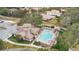 Resort-style community pool with lounge chairs and cabanas at 25500 Hawks Run Ln, Sorrento, FL 32776