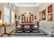 Formal dining room with chandelier and hardwood floors at 25500 Hawks Run Ln, Sorrento, FL 32776