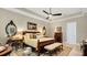 Spacious main bedroom with king-size bed and plenty of natural light at 25500 Hawks Run Ln, Sorrento, FL 32776