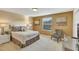 Cozy bedroom with queen-size bed and built-in storage at 2616 Santosh Cv, Kissimmee, FL 34746