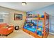 Fun bedroom with bunk beds and Mickey Mouse theme at 2616 Santosh Cv, Kissimmee, FL 34746