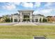 Modern community center with gated entrance at 2616 Santosh Cv, Kissimmee, FL 34746