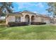 Charming single-story home featuring manicured landscaping and a two-car garage at 268 Heatherbrooke Cir, Oviedo, FL 32765
