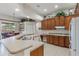 Spacious kitchen with an island, ample cabinetry, and a view to the backyard at 268 Heatherbrooke Cir, Oviedo, FL 32765