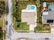 Aerial view showing single-story house, pool, and yard at 2700 Dorado Ct, Apopka, FL 32703