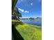 Scenic waterfront view with lush green landscape at 2700 Hoover Dr, Deltona, FL 32738