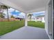 Spacious covered patio overlooking the backyard at 2712 Alamo Dr, Orlando, FL 32805