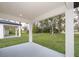 Covered patio overlooking a grassy backyard at 2909 S Palmetto Ave, Sanford, FL 32773