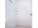 Walk-in shower with glass enclosure and hexagon tile floor at 2909 S Palmetto Ave, Sanford, FL 32773