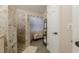 Spa-like bathroom with walk-in shower and decorative flooring at 3202 Alling, Deltona, FL 32725