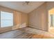 Bright bedroom with vinyl plank flooring and large window at 3202 Alling, Deltona, FL 32725