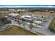 Aerial view of commercial building with parking lot at 3465 Middlebrook Pl, Harmony, FL 34773