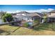 Aerial view of house with pool and backyard at 3465 Middlebrook Pl, Harmony, FL 34773