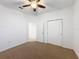 Bright bedroom with ceiling fan and neutral carpeting at 3465 Middlebrook Pl, Harmony, FL 34773