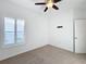 Bright bedroom with ceiling fan and neutral carpeting at 3465 Middlebrook Pl, Harmony, FL 34773