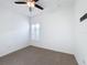 Bright bedroom with ceiling fan and neutral carpeting at 3465 Middlebrook Pl, Harmony, FL 34773