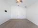 Spacious bedroom with neutral carpet and double door closets at 3465 Middlebrook Pl, Harmony, FL 34773