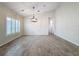 Bright dining room with tile floors and chandelier at 3465 Middlebrook Pl, Harmony, FL 34773