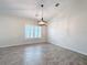 Bright dining room featuring tile floors and a chandelier at 3465 Middlebrook Pl, Harmony, FL 34773