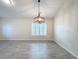 Dining room with tile floors, large window with shutters, and a modern chandelier at 3465 Middlebrook Pl, Harmony, FL 34773