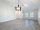 Elegant dining room featuring tile floors, a chandelier and ample natural light at 3465 Middlebrook Pl, Harmony, FL 34773