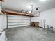 Attached garage with overhead storage and extra space at 3465 Middlebrook Pl, Harmony, FL 34773