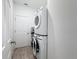 Stackable washer and dryer in this laundry room at 3465 Middlebrook Pl, Harmony, FL 34773