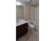 Clean bathroom with tub, toilet and vanity at 3656 Brighton Park Cir, Orlando, FL 32812