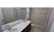 Bathroom with double sinks, shower, and toilet at 3656 Brighton Park Cir, Orlando, FL 32812