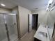 Bathroom with shower and double vanity at 3656 Brighton Park Cir, Orlando, FL 32812