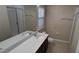 Bathroom with double sinks, shower, and toilet at 3656 Brighton Park Cir, Orlando, FL 32812