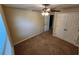 Bright bedroom featuring neutral walls and carpeted floors at 3656 Brighton Park Cir, Orlando, FL 32812