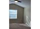 Bedroom with vaulted ceiling, window, and carpet at 3656 Brighton Park Cir, Orlando, FL 32812