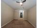 Bedroom with carpet and access to hallway at 3656 Brighton Park Cir, Orlando, FL 32812