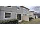 Rear view of the house showing sliding glass door at 3656 Brighton Park Cir, Orlando, FL 32812