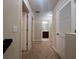 Upstairs hallway with access to bedrooms and bathroom at 3656 Brighton Park Cir, Orlando, FL 32812