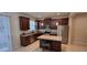 Modern kitchen with stainless steel appliances and an island at 3656 Brighton Park Cir, Orlando, FL 32812