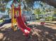 playground with slides and climbing structures at 3656 Brighton Park Cir, Orlando, FL 32812