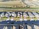 Aerial view of a row of houses in a residential neighborhood at 3975 Great Smokey Way, Apopka, FL 32712