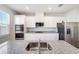 Modern kitchen with stainless steel appliances at 3975 Great Smokey Way, Apopka, FL 32712