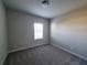 Spacious bedroom with neutral carpeting at 419 Venetian Palms Blvd, New Smyrna Beach, FL 32168