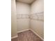 Large walk-in closet with wire shelving at 419 Venetian Palms Blvd, New Smyrna Beach, FL 32168