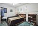 Cozy bedroom with a double bed and built-in shelving at 4239 Shades Crest Ln, Sanford, FL 32773