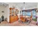 Bright dining room featuring a wood table, chairs, and hutch at 4239 Shades Crest Ln, Sanford, FL 32773