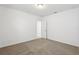 Empty bedroom showing neutral carpet and a closet ready for personalization at 4508 Windy Oak Way, St Cloud, FL 34772