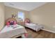 Minnie Mouse themed bedroom with twin beds at 4765 Ormond Beach Way, Kissimmee, FL 34746