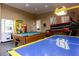 Fun game room with air hockey, pool table, and arcade games at 4765 Ormond Beach Way, Kissimmee, FL 34746