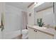 Bathroom with tub, toilet and vanity at 490 Sweetwater Way, Haines City, FL 33844