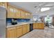 Modern kitchen featuring stainless steel appliances and ample counter space at 490 Sweetwater Way, Haines City, FL 33844